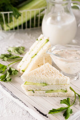 Summer snack mini sandwiches with cucumber and yogurt sauce
