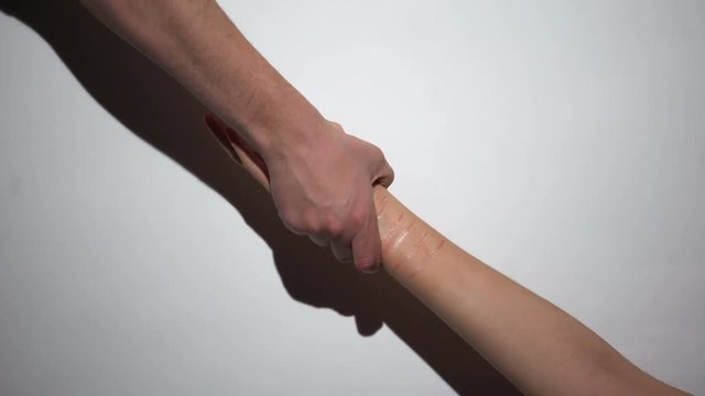 Hand of self-inflicted female asking help, person suffering mental disease