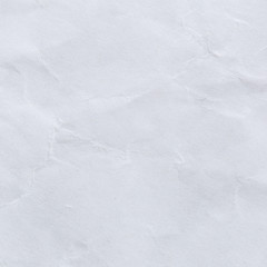 Obraz premium Crumpled white recycled paper background for business communication and education concept design.
