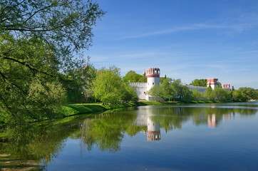Fototapeta na wymiar Novodevichy convent and Big Novodevichy pond on a Sunny spring day. Moscow, Russia