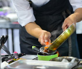 Chef cooking food in the kitchen, Chef preparing food