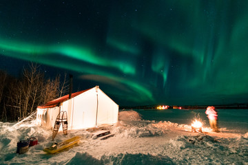 Glowing Tent with Aurora in Alaska / Northern Lights Tour