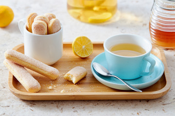Sponge finger biscuits served with a cup of tea