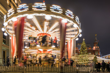 Festive New Year Illumination on the Manezhnaya square near Red square and Kremlin, Moscow, Russia.