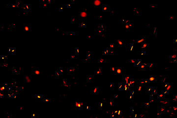 flame of fire with sparks black background