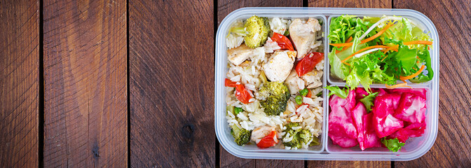Lunch box  chicken, broccoli, green peas, tomato  with rice and red cabbage. Healthy fitness food....
