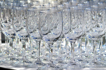 A lot of glass lining up at the counter