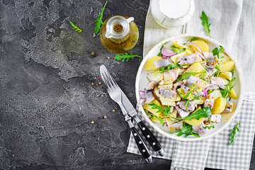 Traditional  salad of salted herring fillet, fresh apples,  red onion  and potatoes. Kosher food....