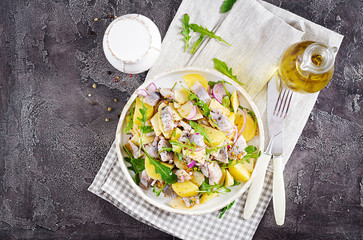 Traditional  salad of salted herring fillet, fresh apples,  red onion  and potatoes. Kosher food....