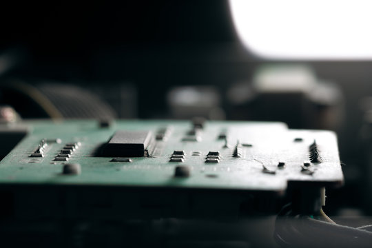 Electronic circuit board close up. Lens flare - Powered by Adobe