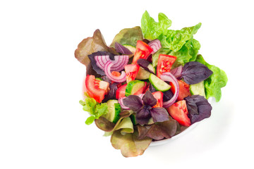 Closeup of vegetable salad on white background