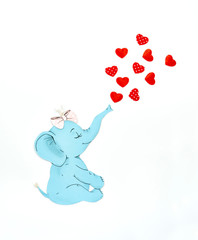 Elephant and hearts on the white background