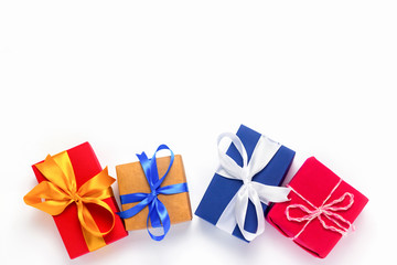 Many gift boxes on a white background. The concept of the holiday, gifts for anyone and relatives, New Year, Christmas, Birthday. Flat lay, top view.