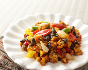 Delicious Chinese cuisine, fried frog with yellow peel fruit