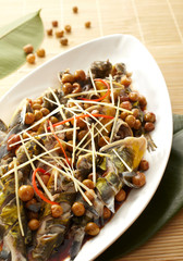 Delicious Chinese cuisine, steamed yellow bone fish with yellow skin fruit