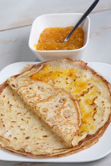 delicious pancakes with orange jam