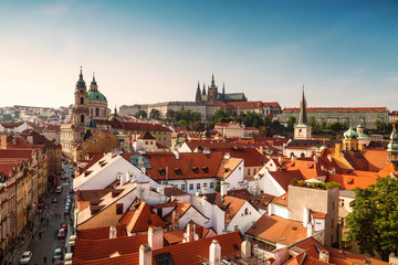 Naklejka na ściany i meble View of Prague rooftops, St. Vitus Cathedral and St. Nicholas Cathedral. Czech republic