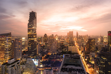 Top View of City. Cityscape with Car Traffic Light Trial at Twilight Time, Bangkok, Thailand.