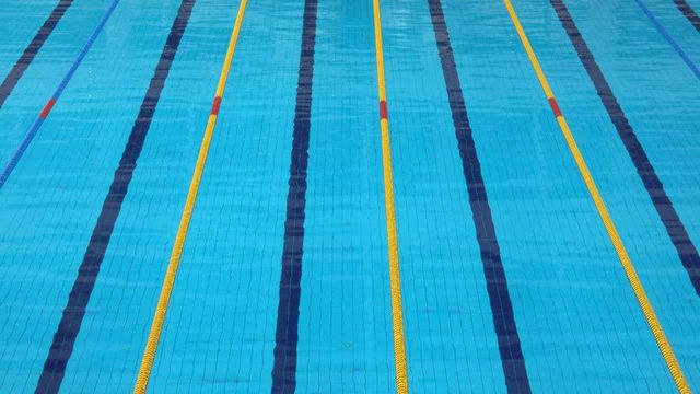 4k Footage of swimming pool with marked lanes. 