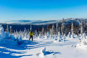 Ski in Beskidy mountains. The skituring man, backcountry skiing in fresh powder snow.