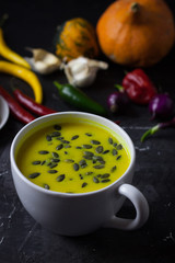 Pumpkin asian coconat cream soup. Autumn hot food