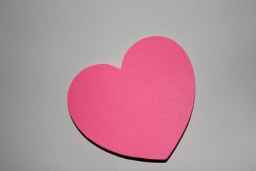 Valentines day card with sticky note in the shape of a heart