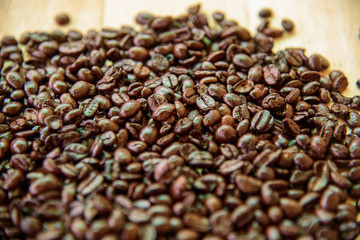 coffee bean to the heap of coffee bean