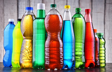 Plastic bottles of assorted carbonated soft drinks