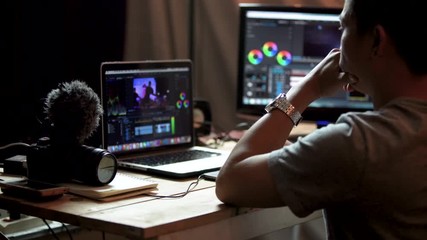 Content creators editing video on laptop computer using program cutting video footage record with camera this is lifestyle of content creators or blogger freelance