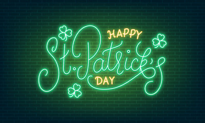 Patricks Day. Neon glowing lettering sign of Happy St. Patrick's Day lettering and clover leaves. - obrazy, fototapety, plakaty