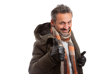 Person showing thumb-up as holding jacket.