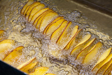 Potatoes  in boiling fat