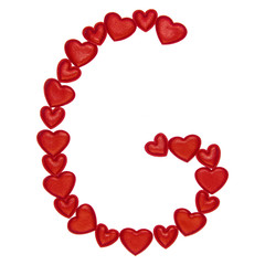 Letter G made from decorative red hearts. Isolated on white background. Concepts: ABC, alphabet, logo, words, symbols, love, valentines day