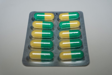 Pills on white background