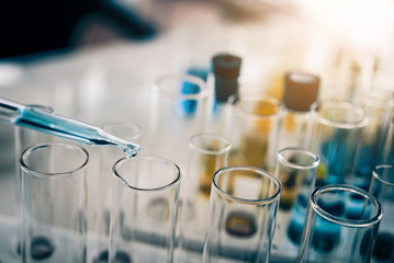 Test tube containing chemical liquid in laboratory, lab chemistry or science research and development concept.  