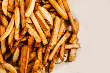fried potatoes on white background