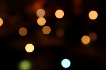 Bokeh lights at night, dark background