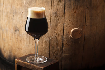 Stout near a barrel