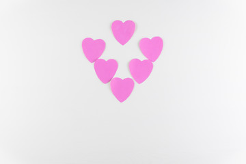 Hand-made pink love hearts isolated on white wooden texture background, Happy valentine's day. holiday background, Flat lay, top view, copy space