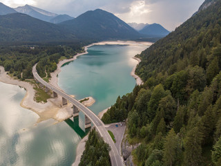 Amazing bridge over accumulation lake Sylvenstein, upper Bavaria. Aerial view. September, 2018