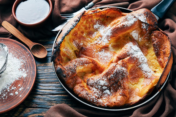 sweet dutch baby pancake on a skillet