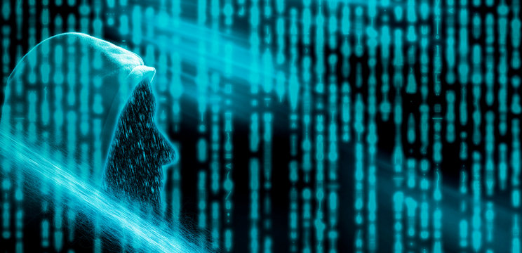 Faceless hooded anonymous computer hacker 