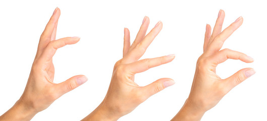 Set of woman hands holding something with two fingers