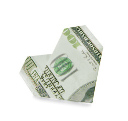 Origami heart made of dollar banknote on white background