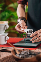 Fototapeta na wymiar Weighing Coffee For Making Drip Coffee