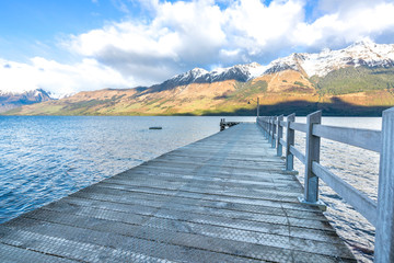 Wooden jetty at Glenorchy lake, New Zealand.