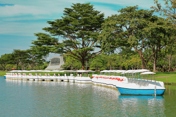 panorama landscape of Suan Luang Reign 9 at Thailand,tourist attraction for recreation,white swan paddle boat for rent in lake,white duck paddle boat in pond at the park,garden with relax in day time