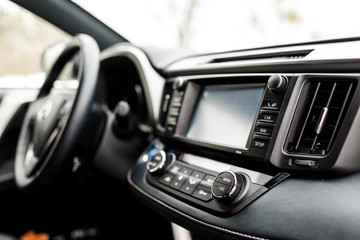 Fototapeta na wymiar Luxury prestige car interior, dashboard, steering wheel.