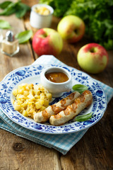 Grilled sausages with potato apple salad