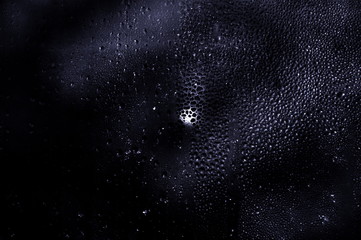 Abstraction. Drops on the glass.